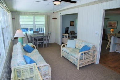 Light, airy, and inviting, this beautifully updated home is on Six Lakes Country Club in Florida - for sale on GolfHomes.com, golf home, golf lot