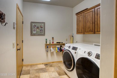 Escape to the cool pines with this single level furnished home on Pinetop Lakes Country Club in Arizona - for sale on GolfHomes.com, golf home, golf lot