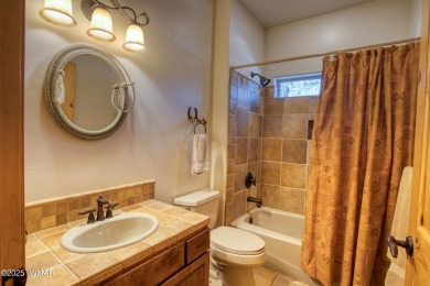 Escape to the cool pines with this single level furnished home on Pinetop Lakes Country Club in Arizona - for sale on GolfHomes.com, golf home, golf lot