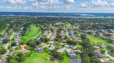 Welcome to this beautifully updated pool home, offering on The Meadows Golf and Country Club in Florida - for sale on GolfHomes.com, golf home, golf lot