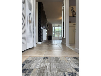 Welcome to THIS BRIGHT and STUNNING unit in a great 55+ on Sunrise Lakes Phase III in Florida - for sale on GolfHomes.com, golf home, golf lot