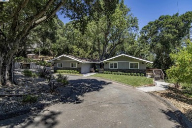 Custom-built luxury home on the peaceful wooded hillside. Enjoy on Castlewood Country Club in California - for sale on GolfHomes.com, golf home, golf lot