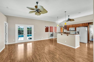 If you're looking for peaceful golf course living with oversized on Eagle Lakes Golf Club in Florida - for sale on GolfHomes.com, golf home, golf lot