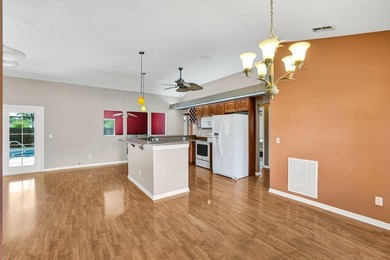 If you're looking for peaceful golf course living with oversized on Eagle Lakes Golf Club in Florida - for sale on GolfHomes.com, golf home, golf lot