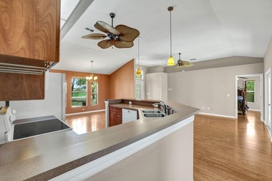 If you're looking for peaceful golf course living with oversized on Eagle Lakes Golf Club in Florida - for sale on GolfHomes.com, golf home, golf lot