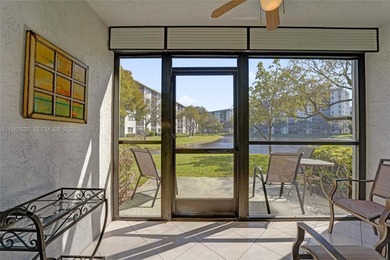 *** BEAUTIFUL VIEW ON THE LAKE FROM THE 1ST FLOOR UNIT FROM THE on Palm-Aire Country Club and Resort - Palms in Florida - for sale on GolfHomes.com, golf home, golf lot