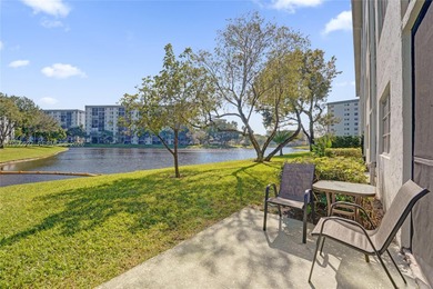 *** BEAUTIFUL VIEW ON THE LAKE FROM THE 1ST FLOOR UNIT FROM THE on Palm-Aire Country Club and Resort - Palms in Florida - for sale on GolfHomes.com, golf home, golf lot