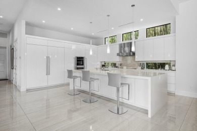 A breathtaking fusion of striking modern architecture and on St. Andrews Country Club of Boca Raton in Florida - for sale on GolfHomes.com, golf home, golf lot