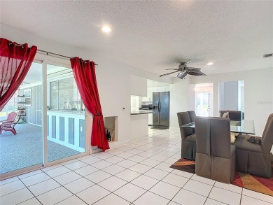 This property listing highlights a spacious home located near on Deltona Golf Club in Florida - for sale on GolfHomes.com, golf home, golf lot