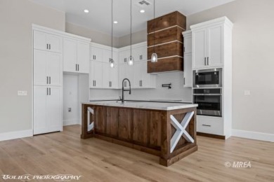 Discover an extraordinary opportunity to own a custom home with on Falcon Ridge Golf Course in Nevada - for sale on GolfHomes.com, golf home, golf lot