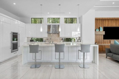 A breathtaking fusion of striking modern architecture and on St. Andrews Country Club of Boca Raton in Florida - for sale on GolfHomes.com, golf home, golf lot