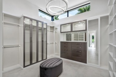 A breathtaking fusion of striking modern architecture and on St. Andrews Country Club of Boca Raton in Florida - for sale on GolfHomes.com, golf home, golf lot
