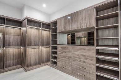 A breathtaking fusion of striking modern architecture and on St. Andrews Country Club of Boca Raton in Florida - for sale on GolfHomes.com, golf home, golf lot