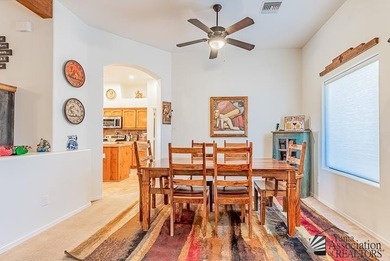 Wake up to big desert skies and mountain views in this warm on Foothills Executive Golf Course in Arizona - for sale on GolfHomes.com, golf home, golf lot