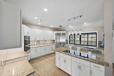 Come experience this impressive 6-bedroom, 5-bath residence with on St. Lucie Trail Golf Club in Florida - for sale on GolfHomes.com, golf home, golf lot