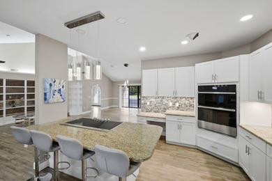 Come experience this impressive 6-bedroom, 5-bath residence with on St. Lucie Trail Golf Club in Florida - for sale on GolfHomes.com, golf home, golf lot