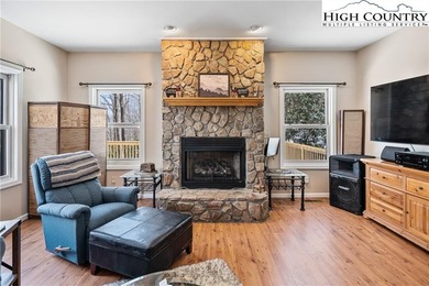 Private, light filled mountain retreat with golf course and on Mountain Aire Golf Course in North Carolina - for sale on GolfHomes.com, golf home, golf lot