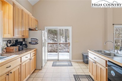 Private, light filled mountain retreat with golf course and on Mountain Aire Golf Course in North Carolina - for sale on GolfHomes.com, golf home, golf lot