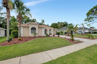 Discover luxurious living at 5348 Legend Hills Ln, nestled in on Silverthorn Country Club in Florida - for sale on GolfHomes.com, golf home, golf lot