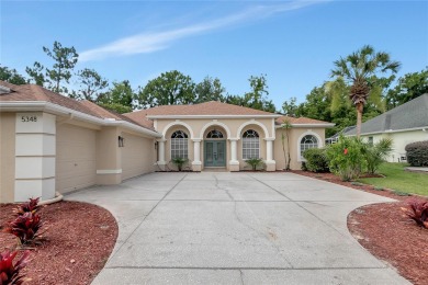 Discover luxurious living at 5348 Legend Hills Ln, nestled in on Silverthorn Country Club in Florida - for sale on GolfHomes.com, golf home, golf lot