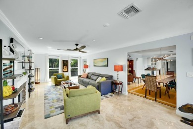 Welcome to a truly unique two-story Southern Colonial home on Deer Creek Golf Club in Florida - for sale on GolfHomes.com, golf home, golf lot