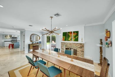 Welcome to a truly unique two-story Southern Colonial home on Deer Creek Golf Club in Florida - for sale on GolfHomes.com, golf home, golf lot