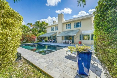 Welcome to a truly unique two-story Southern Colonial home on Deer Creek Golf Club in Florida - for sale on GolfHomes.com, golf home, golf lot