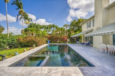 Welcome to a truly unique two-story Southern Colonial home on Deer Creek Golf Club in Florida - for sale on GolfHomes.com, golf home, golf lot