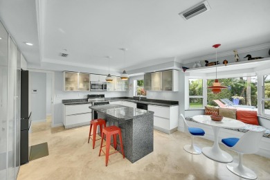 Welcome to a truly unique two-story Southern Colonial home on Deer Creek Golf Club in Florida - for sale on GolfHomes.com, golf home, golf lot
