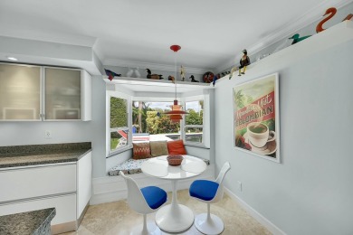 Welcome to a truly unique two-story Southern Colonial home on Deer Creek Golf Club in Florida - for sale on GolfHomes.com, golf home, golf lot