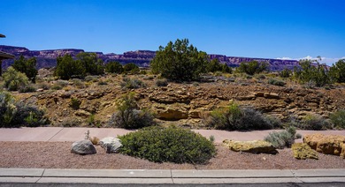 Nestled on the edge of a dramatic cliff, this exceptional on The Golf Club At Redlands Mesa in Colorado - for sale on GolfHomes.com, golf home, golf lot