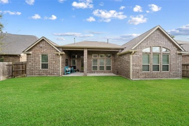 Welcome to this beautifully maintained, single-story gem on Woodforest Golf Club at Fish Creek in Texas - for sale on GolfHomes.com, golf home, golf lot