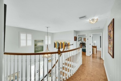 Welcome to a truly unique two-story Southern Colonial home on Deer Creek Golf Club in Florida - for sale on GolfHomes.com, golf home, golf lot