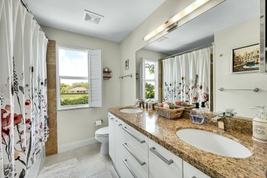 Welcome to a truly unique two-story Southern Colonial home on Deer Creek Golf Club in Florida - for sale on GolfHomes.com, golf home, golf lot