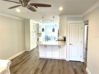 If you are looking for a fully updated, ground floor, lakefront on On Top Of The World Golf Course in Florida - for sale on GolfHomes.com, golf home, golf lot