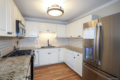 Bright Renovated Corner Unit! Every detail was thoughtfully on The Greens At Half Hollow in New York - for sale on GolfHomes.com, golf home, golf lot