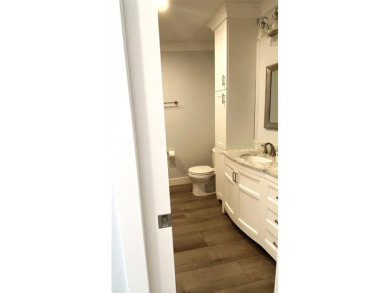 If you are looking for a fully updated, ground floor, lakefront on On Top Of The World Golf Course in Florida - for sale on GolfHomes.com, golf home, golf lot