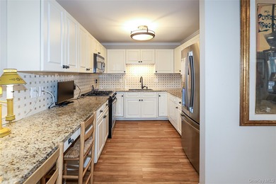 Bright Renovated Corner Unit! Every detail was thoughtfully on The Greens At Half Hollow in New York - for sale on GolfHomes.com, golf home, golf lot