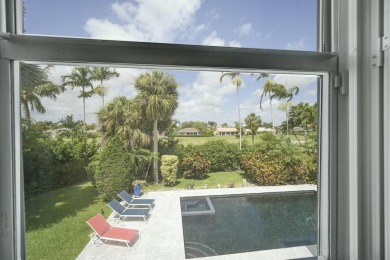 Welcome to a truly unique two-story Southern Colonial home on Deer Creek Golf Club in Florida - for sale on GolfHomes.com, golf home, golf lot
