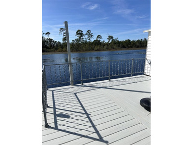 Welcome to Kove Estates a 55+ gated community located between on Cypress Point RV Golf Club in Florida - for sale on GolfHomes.com, golf home, golf lot