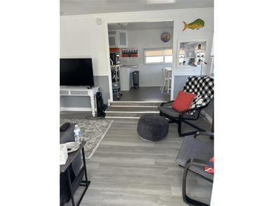 Welcome to Kove Estates a 55+ gated community located between on Cypress Point RV Golf Club in Florida - for sale on GolfHomes.com, golf home, golf lot