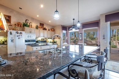 Spacious 3 bed, 2.5 bath home with a 3-car garage sits on a on Eagles Nest at Pebble Creek in Arizona - for sale on GolfHomes.com, golf home, golf lot