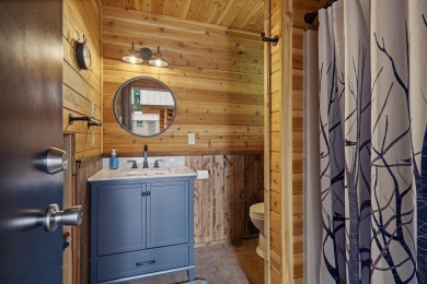 Escape the ordinary in this stunning log home sitting on just on Chewelah Golf and Country Club  in Washington - for sale on GolfHomes.com, golf home, golf lot