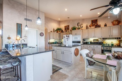 Spacious 3 bed, 2.5 bath home with a 3-car garage sits on a on Eagles Nest at Pebble Creek in Arizona - for sale on GolfHomes.com, golf home, golf lot