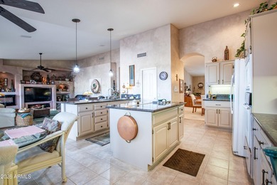 Spacious 3 bed, 2.5 bath home with a 3-car garage sits on a on Eagles Nest at Pebble Creek in Arizona - for sale on GolfHomes.com, golf home, golf lot