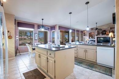 Spacious 3 bed, 2.5 bath home with a 3-car garage sits on a on Eagles Nest at Pebble Creek in Arizona - for sale on GolfHomes.com, golf home, golf lot