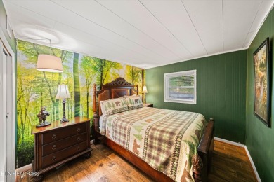 This charming 3-bedroom, 2-bathroom home, offering over 1,600 sq on Gatlinburg Golf Course in Tennessee - for sale on GolfHomes.com, golf home, golf lot