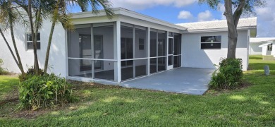Step into this superbly renovated Challenger model on a corner on Leisureville Community Golf Course in Florida - for sale on GolfHomes.com, golf home, golf lot
