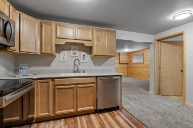 Escape the ordinary in this stunning log home sitting on just on Chewelah Golf and Country Club  in Washington - for sale on GolfHomes.com, golf home, golf lot