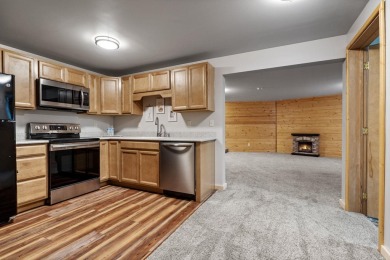 Escape the ordinary in this stunning log home sitting on just on Chewelah Golf and Country Club  in Washington - for sale on GolfHomes.com, golf home, golf lot